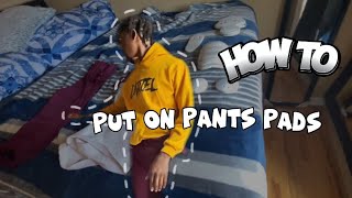 How to put on football pants pads [upl. by Normandy]