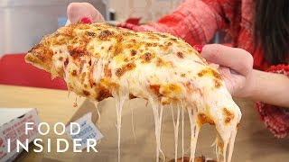 How Dominos Makes Its Pizza  Food Insider [upl. by Aicatsan]