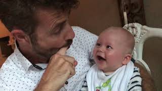 Baby laughing hysterical while dad pops his mouth [upl. by Aerdnuahs]