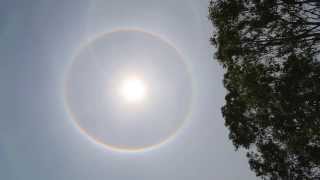 Circular halo ring rainbow around sun  halo nimbus icebow gloriole [upl. by Alford188]