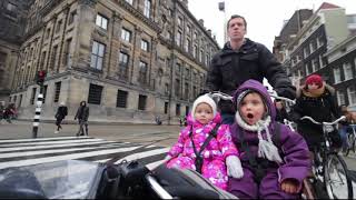 Biking in Amsterdam on a bakfiets with kids [upl. by Ainoloppa]