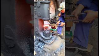 Blacksmith forges red hot ironforging [upl. by Ilek510]