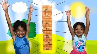 GIANT JENGA XL Cardboard Block Game for Kids with Eggs Surprise Toy  Naiah amp Elli Toys Show [upl. by Maroney712]