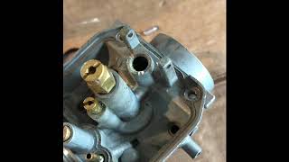 Removing the seat from a carburetor Needle seat [upl. by Ruyle]