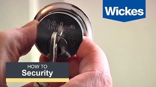 How to fit a British Rim Cylinder Lock with Wickes [upl. by Novehs]