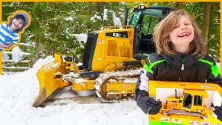 Bruder Trucks  Real Bulldozer Vs Toy Bulldozer Plowing Snow [upl. by Erb]