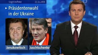 Tagesschau vor 20 Jahren 21112004  Jens Riewa und Reinhold Beckmann [upl. by Yzdnil]