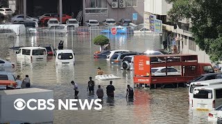 Videos show Dubai streets flooded after record rainfall inundates UAE [upl. by Azeret195]