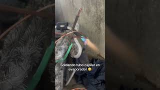 Soldando tubo capilar en evaporador 😬 fypシ゚viral refrigerador refrigeracion youtubeshorts [upl. by Tamarra]