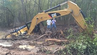 Stuck Trackhoe Excavator Buried Rental Disaster Caterpillar Part 1… [upl. by Drarig]