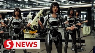 Humanoid robots come to life in Chinese factory [upl. by Doomham]