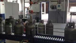 Gas cylinder processing on quotZero Pressurequot roller acclimation conveyor [upl. by Iahs233]