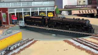 HO scale Norfolk and Western 1218 leaves the roundhouse to start its excursion tour [upl. by Atterrol941]