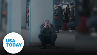 Tearful scenes at Kyiv train station  USA TODAY [upl. by Silrak]