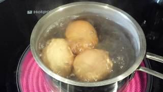 Boiling Three Eggs using an electric cooker [upl. by Nairrod]