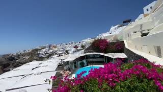 Santorini Canaves Suites Oia Santorini  main pool and restaurant area with Caldera dramatic views [upl. by Airahcaz299]