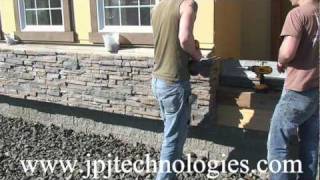 Installation Stacked Stone Veneer Panels over using cultured stone part 1 [upl. by Nekciv]