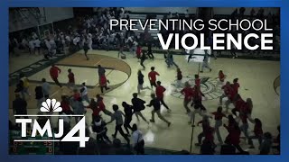 Violence breaks out during basketball game how schools can prevent it [upl. by Aremihc561]