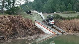 Removing Cattails and Bulrush from a 80 acres Lake Video [upl. by Quitt211]