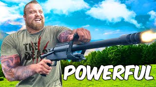 Worlds Strongest Man VS WORLDS BIGGEST GUN [upl. by Dnalrag]