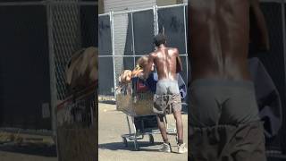 Homeless man pushes his homeless wife on the shopping cart [upl. by Pius789]