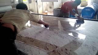 Applying epoxy  polymer to granite slab  India granite processing factory [upl. by Bardo]