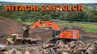 Hitachi ZX670 loading stone on a road project [upl. by Rew363]