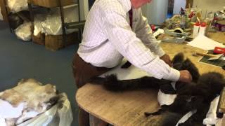 Hand finishing Glencroft sheepskin rugs [upl. by Dorcia286]