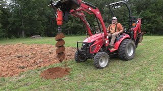 Skid Steer Auger on a 25HP Tractor Tractor Post Hole Auger TYM T25 [upl. by Enitsed]