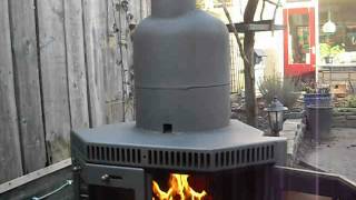 Finished converted wood stove to rocket stove heater [upl. by Lissner62]