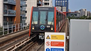 London DLR Train Arriving East India Station  Docklands Light Railway Approaching The Station [upl. by Nehtiek]