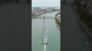 Vertical video Basel Switzerland A tanker cargo barge floats along the Rhine River Basel is a [upl. by Edasalof]