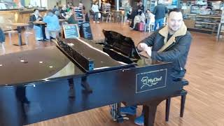 Michał Cholewiński plays Chuck Berry you never can tell amp Boogie Woogie medly at Bergamo Airport [upl. by Hettie952]