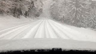 BMW X6 xDrive40d Driving up a Mountain Road in Deep Snow [upl. by Maleeny]