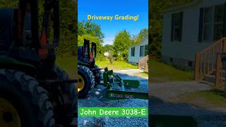 Driveway Grading with a JD 3038E and land plane [upl. by Matland943]