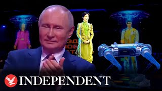 Putin attends opening ceremony of Russian esports featuring robot dogs and holograms [upl. by Sirromed]