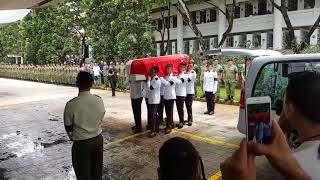 Pallbearers carrying the coffin past the family into the service hall [upl. by Attekram419]