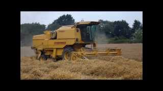 Combining with New Holland Clayson 8070 [upl. by Enilesor]