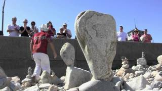 In Narragansett turning shoreline rocks into delicately balanced sculptures [upl. by Yrdua]