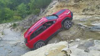 Stock Jeep Cherokee Trailhawk climbs waterfall [upl. by Karita]