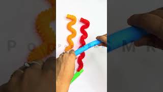 Orange Red Blue Green pop tubes poptubesasmr toys colorfulpoptube relaxingsounds [upl. by Punak]