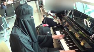 Burka Pianist Amazes Passengers at The Airport [upl. by Eniamrehs]