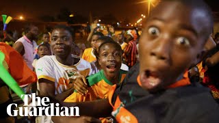 Nigeria and Ivory Coast fans celebrate in streets after reaching AFCON final [upl. by Aiekam]