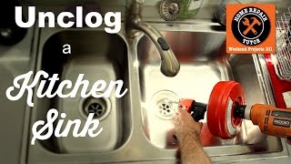 How to Unclog a Kitchen Sink Drain  by Home Repair Tutor [upl. by Socher922]