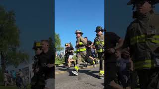 Fully dressed firefighters race in the Jackson Tunnel to Towers 5k race honoring first responders [upl. by Guerin]