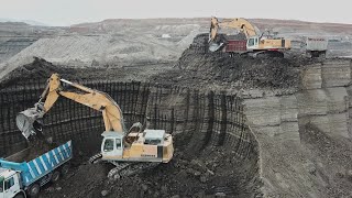 Two Liebherr 974 Excavators Loading Trucks  Aerial View  Ascon Ltd [upl. by Siclari]