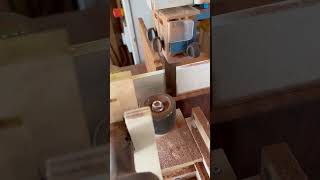 A board from quotThe Treequot quilted mahogany being resawn with a Little Proteus power feeder [upl. by Nawk]