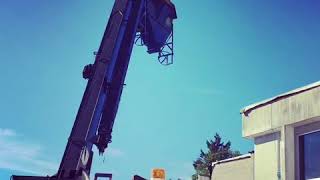 The Simplest Way to Lift Gravel to a Rooftop is to Rent A Crane [upl. by Osrock326]