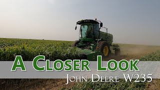 A Closer Look The John Deere W235 Windrower in Action [upl. by Eessej563]