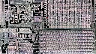 Old retro calculator chip under microscope Detron 832MD [upl. by Artenek724]